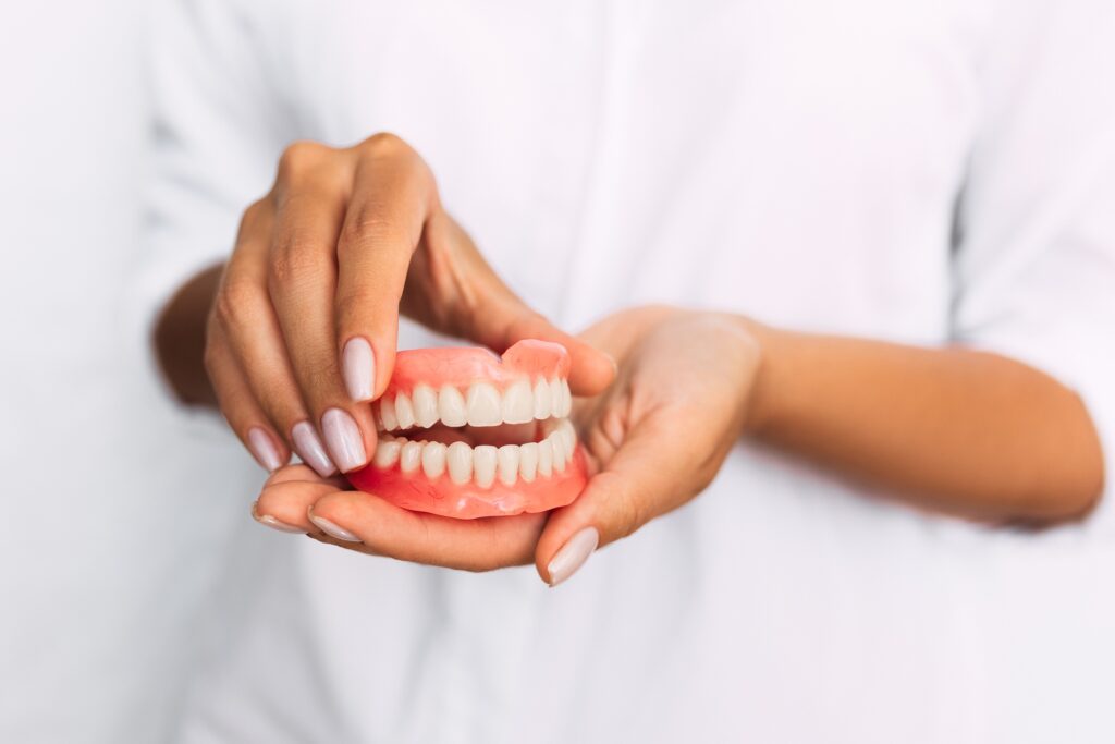 Front view of complete denture. Dentistry conceptual photo. Prosthetic dentistry. False teeth